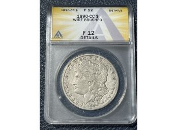 1890-CC Silver Dollar F12 Wire Brushed