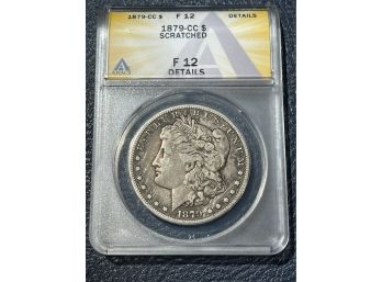 1879-CC Silver Dollar F12 Scratched