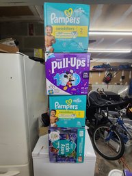 Four Boxes Of Pampers Pull Ups And Easy Ups Size 2.and 3T