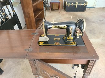 Antique New Home Sewing Machine And Cabinet
