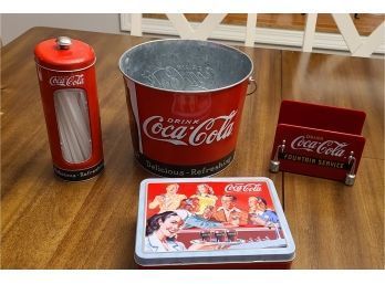 Coca-Cola Memorabilia Package Including Lunch Box Ice Bucket Straw Holder And Napkin Holder