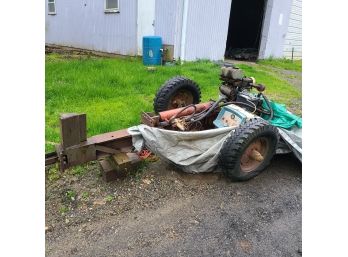 HOME MADE 1 OF A KIND FUNCTIONING HEAVY DUTY LOG SPLITTER.