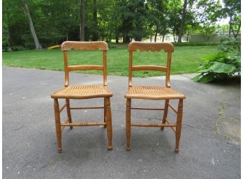 Two Rattan Cane Chairs