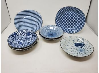 Eight Hand-Glazed Blue & White Ceramic Bowls