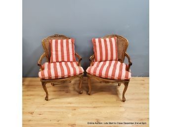 Pair Of Caned Arm Chairs With Striped Cushions
