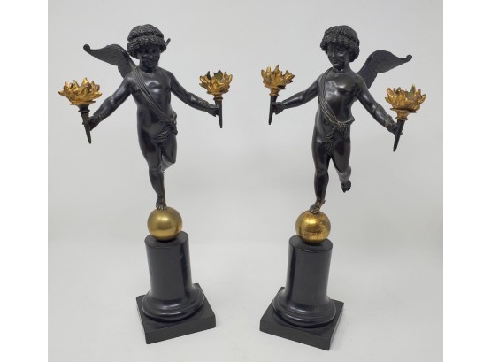 Pair Of Patinated Bronze Putti Candelabra