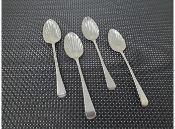 Four 18th Century English Sterling Shell Spoons