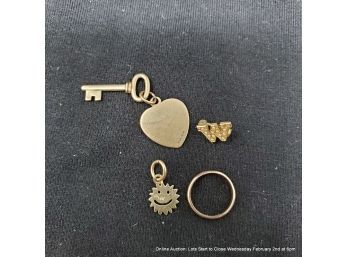 Lot Of Gold Charms And Baby Ring