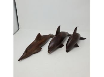 Three Carved Ironwood Dolphins