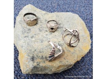 Four Sterling And Silver Tone Rings
