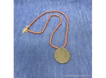 Coral Bead Necklace With Bronze Pendant