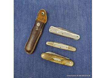 Three Pocket Knives And One Leather Case Including Remington And Argyle