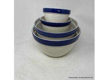Four Nesting Blue Rimmed Ceramic Mixing Bowls