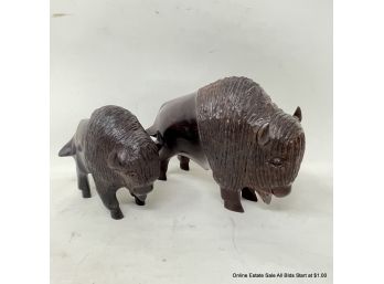 Two (2) Carved Wood Bison
