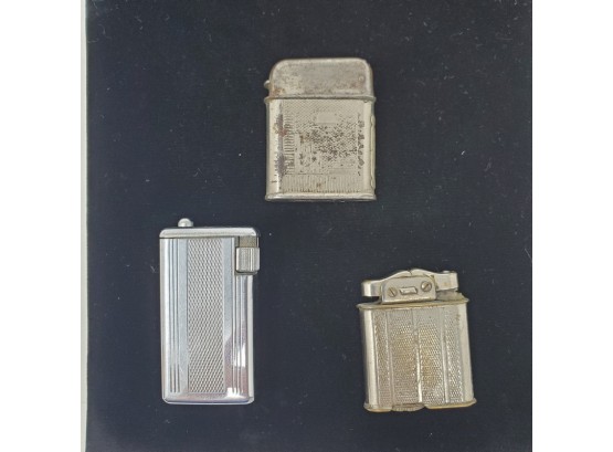 Three Vintage Lighters: Querria, Financ, 77-1