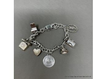 Sterling Silver Seven Charm Bracelet 26 Grams