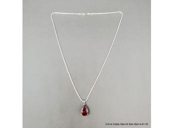 Sterling Silver 23' Chain With A Unidentified Dark Orange Stone Pendant