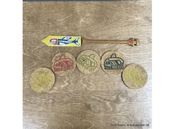 Carved Souvenir Haida-style Paddle And Five Cork Coasters
