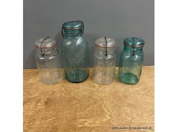 Four Vintage Glass Top Ball Canning Jars