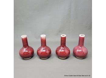 Lot Of Four Oxblood Bud Vases