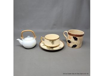 Porcelain Teacups And Teapot