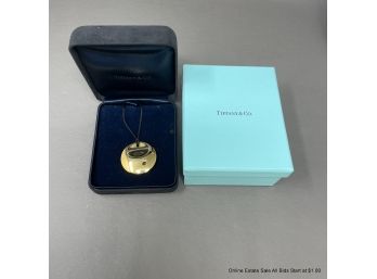 Tiffany & Co. Elsa Peretti 18K Yellow Gold Round Pendant On 18in. Black Silk Cord 11 Grams