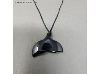 Black Glass Whale Tail On Cord Necklace