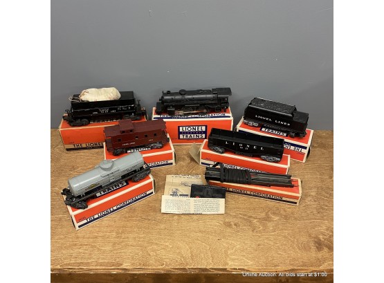 Lionel Train Engine And 5 Cars With Track Set And A Bag Of Coal