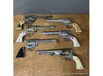 Lot Of Six Replica Revolver Toy Cap Guns Including Nichols, Hubley