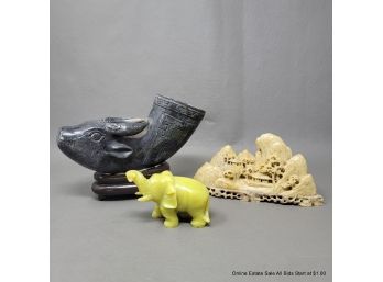 Three Old Chinese Soapstone Carvings Ox Head Rhyton Green Elephant And Rocky Landscape