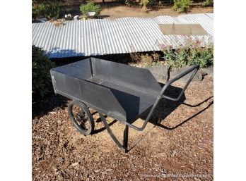 Wheel Barrow With Removable Front Panel For Easy Dumping