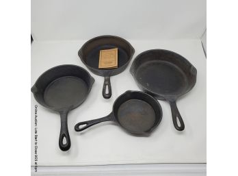 Four Cast Iron Fry Pans