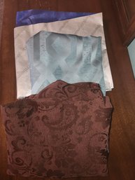 Blue Foil Thermal Blanket, Sea Green Shower Curtain, And Brown Round Tablecloth