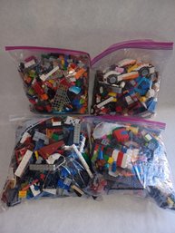 Mixed Storage Bags Of Legos X 4