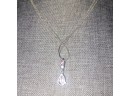 Pink And Silvertone Necklace