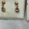 005 Lot Of Two Pink Birth Stone 14kt Gold Earrings (june, October)