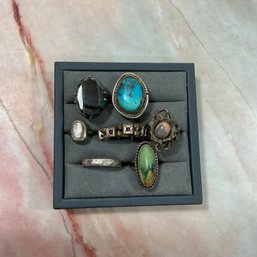 162 Lot Of Seven Silver Rings, Opal, Turquoise, & Hematite
