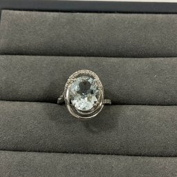 016 10k White Gold Aquamarine Diamond Chip Ring Size 6, 1 Grams
