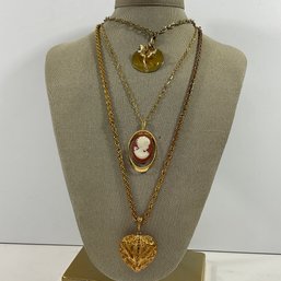 049 Lot Of Three Gold Tone Long Chain Necklaces, Heart, Cameo, Flower Pendants