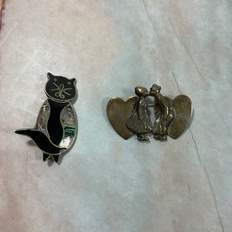 022 Lot Of Two Character Broaches, Cat, & Kissing Couple