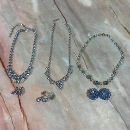 001 Lot Of 7 Baby Blue Rhinestone And Silver Necklaces, Earrings.