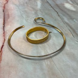 062 Lot Of Two Gold Tone Choker And Engraved Bracelet