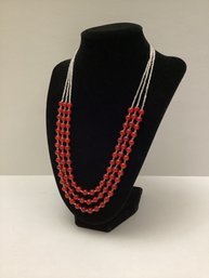 Triple Strand Clear And Red Beaded Handcrafted Necklace