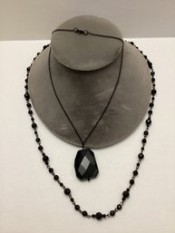 Pair Of Black Faceted Fashion Necklaces