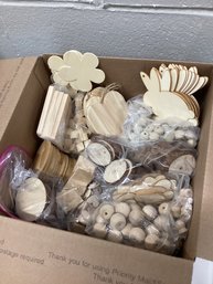 Box Full Of Wooden Craft Supplies