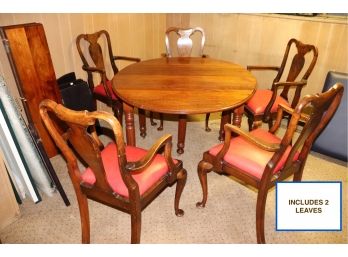 Solid Wood Round Table Is 50' Plus 2 Leaves And 5 Chairs