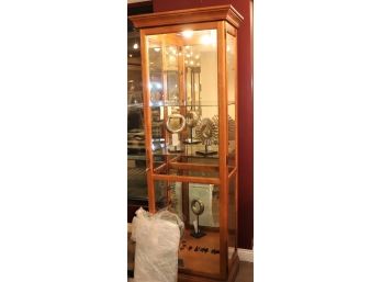Howard Miller Curio Cabinet With A Display Light & Glass Shelves Includes Decorative Items