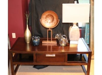 Hammary Cocktail Table With Smoke Glass Shelves & Decorative Accessories