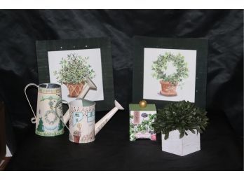 A Pair Of Ivy Topiary Prints, Painted Decorative Watering Cans With Candle & Faux Greenery