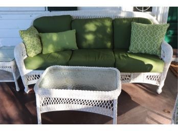 125.Quality Outdoor Faux Wicker Sofa  76 W X 36 D X 35 Tall. With Cushions, Coffee Table